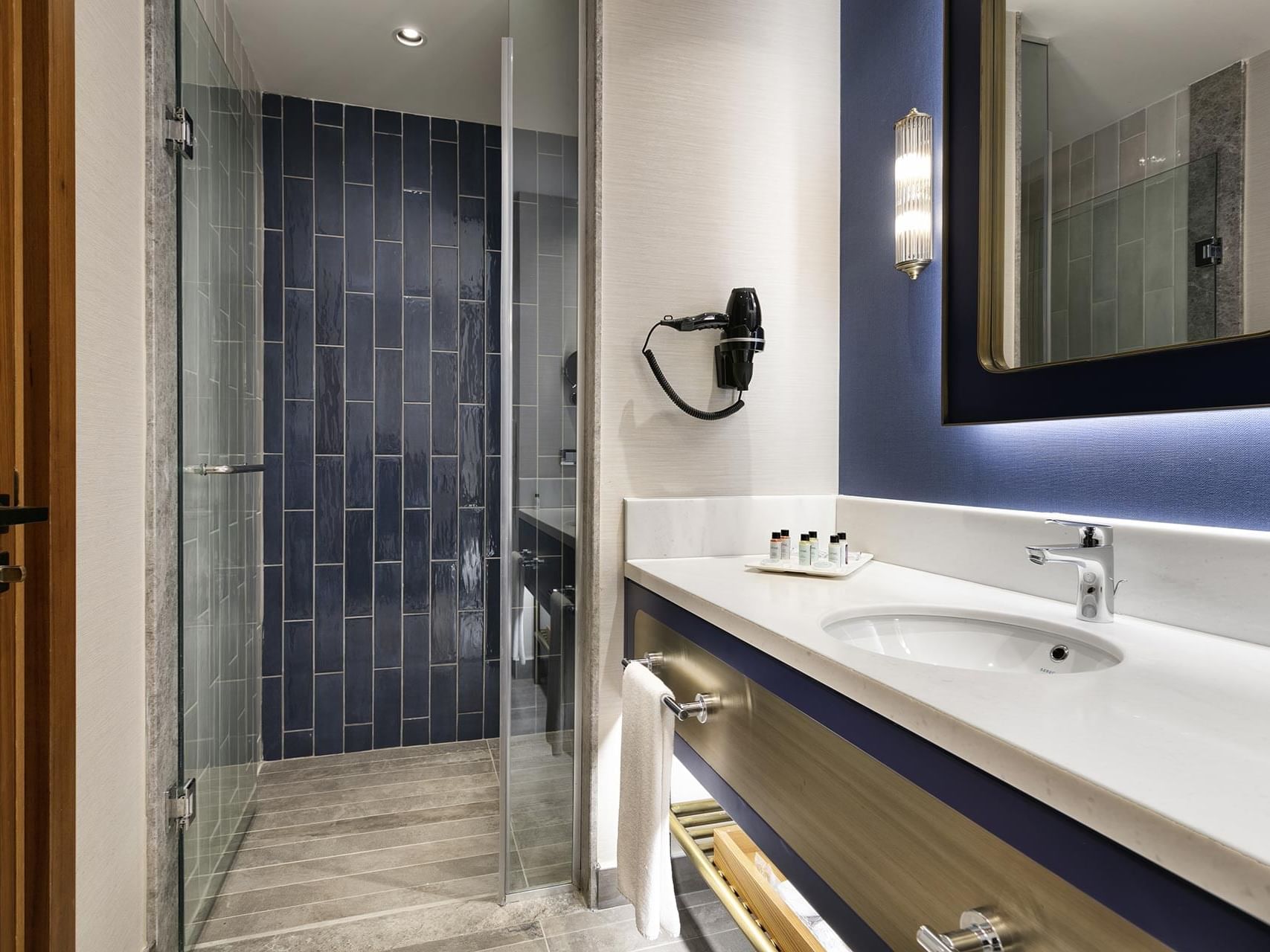 Bathroom vanity with shower room and ceramic wash basin in Duplex Suite at Titanic Deluxe Lara