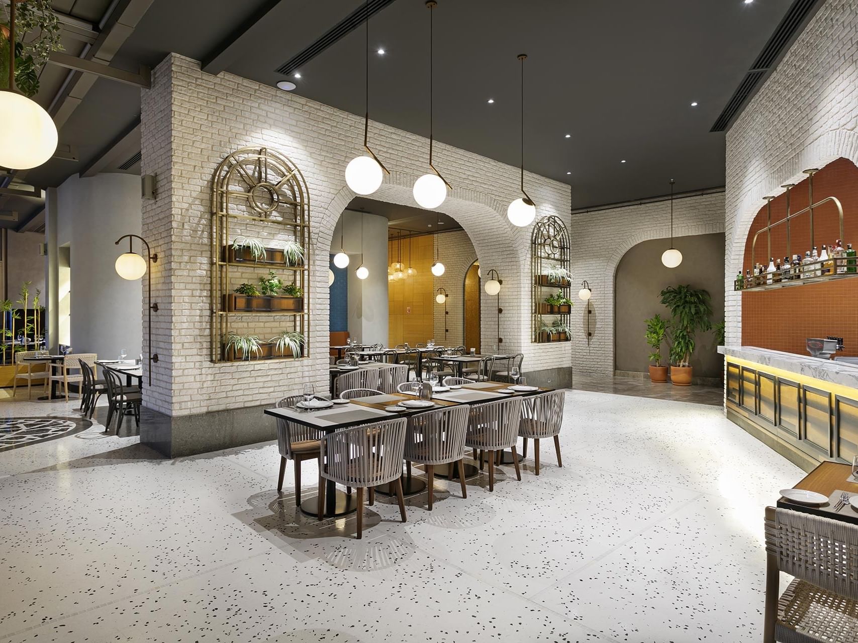 Dining area with tables and chairs in Pascarella Italian Restaurant at Titanic Deluxe Lara