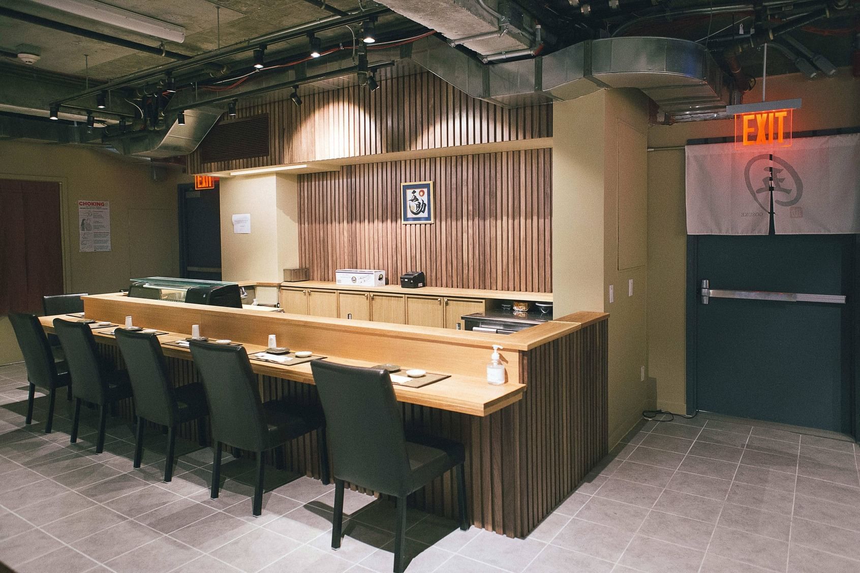 a sushi bar with seating