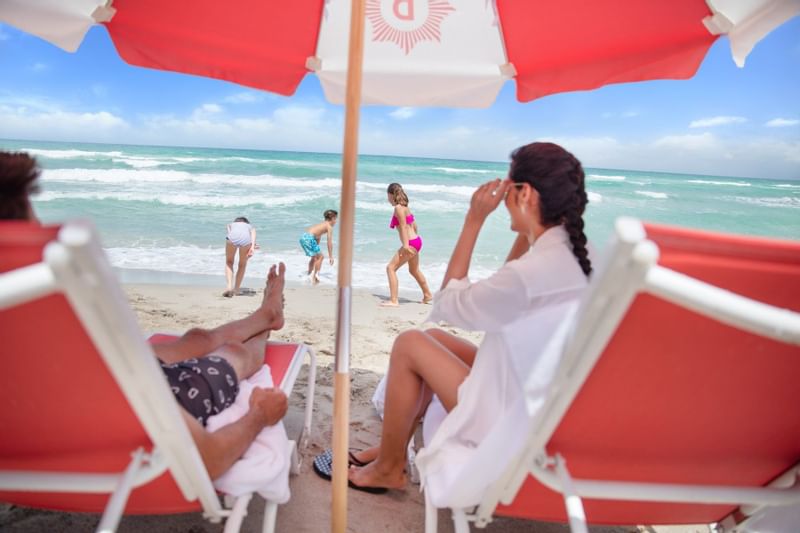 Family enjoying in the Beach at The Diplomat Resort