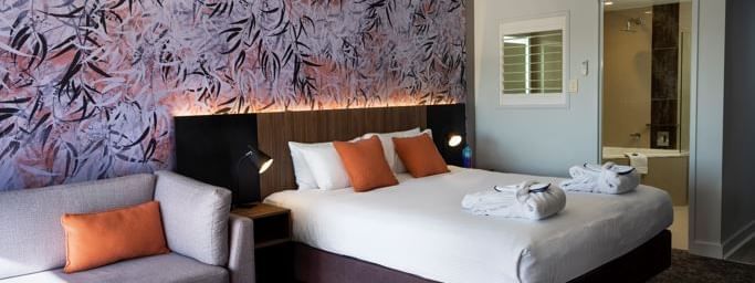 King bed in Comfy bedroom at Novotel Barossa