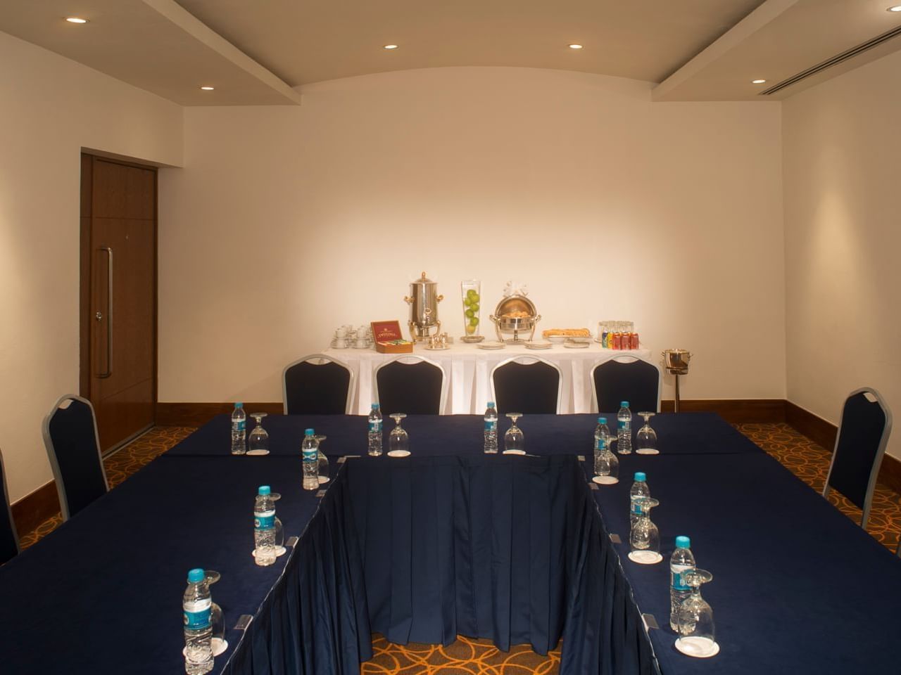 U-shaped table set-up in a meeting room at La Colección Resorts