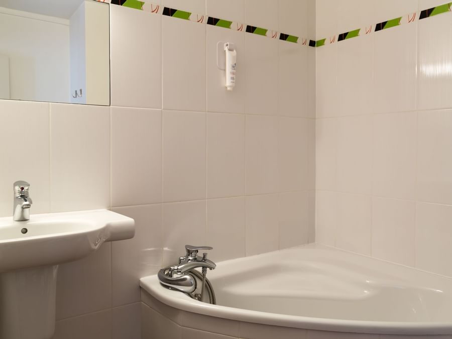 Bathroom vanity in bedrooms at Hotel du Chateau