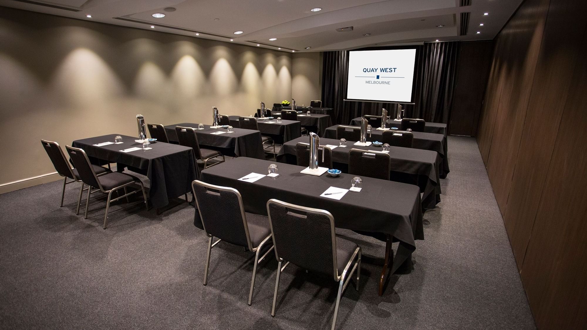 Classroom type table arrangement in Southbank Meeting Room at Quay West Suites Melbourne