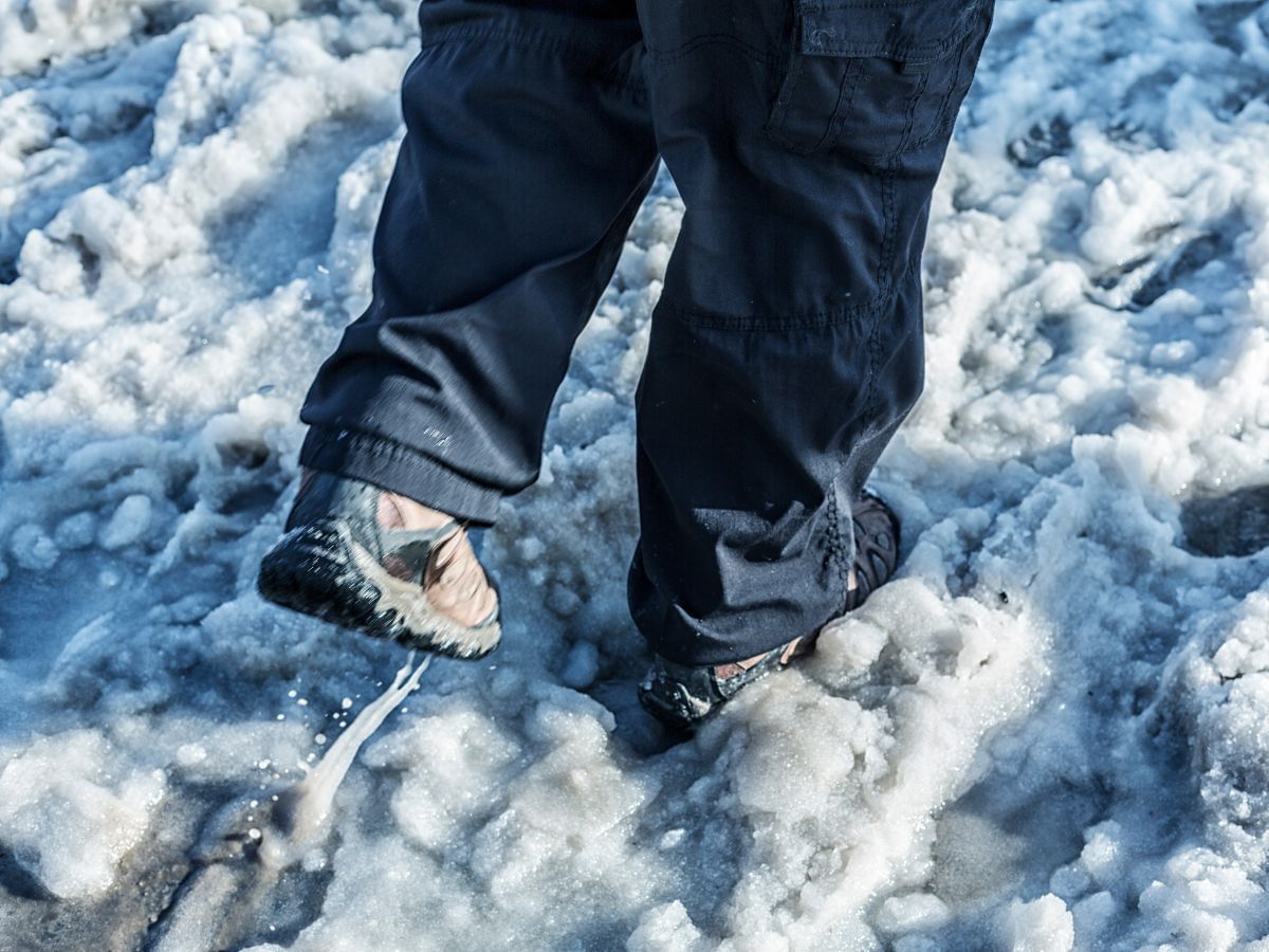 Close-up of walking on snow near Blackcomb Springs Suites
