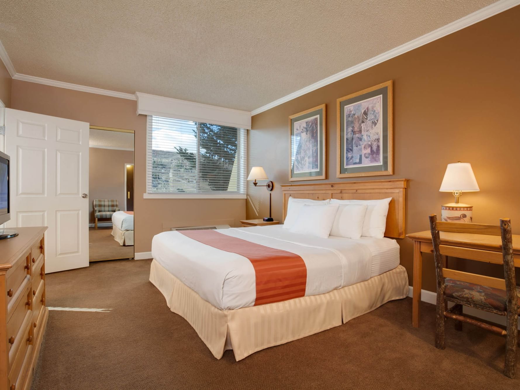 Bedroom in One Bedroom Suite at Legacy Vacation Resorts