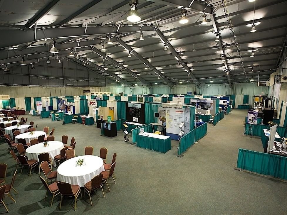 Tables and event booths in ballroom