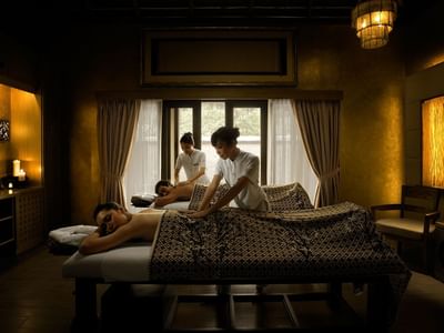 Couple receiving a massage in the Wellness spa at The Banjaran Hotsprings Retreat