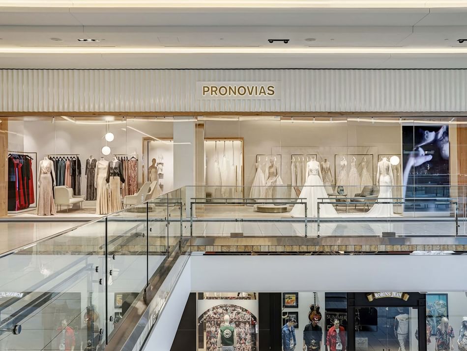Pronovias bridal store interior near Granduca Houston, showcasing elegant wedding dresses and modern decor