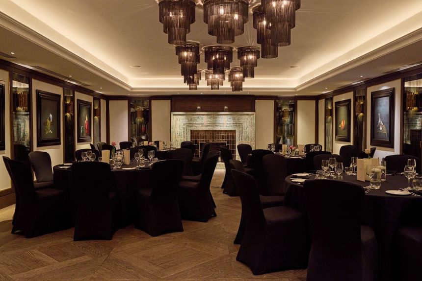 May Fair Kitchen Private Dining Room, Mayfair — seated dinner for up to 64 guests with dedicated bar and emerald fireplace