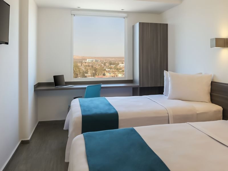 Interior de la habitación Estándar Queen en One Hotels