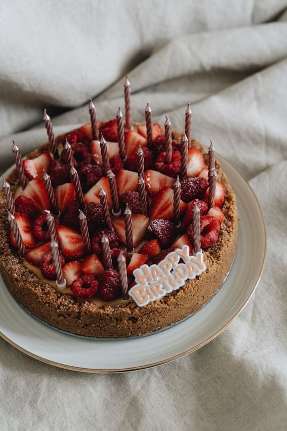 A birthday cake with strawberries