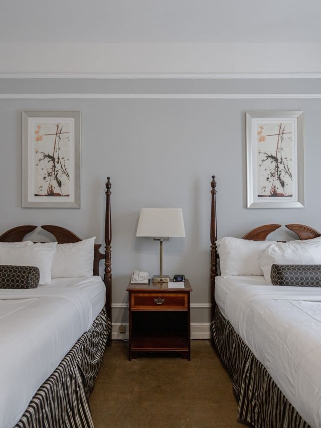 Mineral Water Room with elegant wooden posts and framed art in a room at Arlington Resort Hotel & Spa