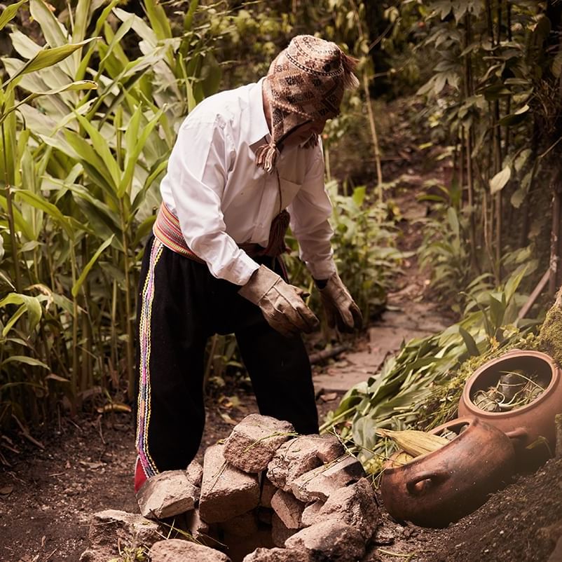 A farmer offering to Pachamanca near Hotel Sumaq