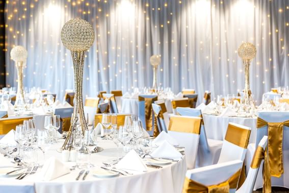 Crystal sphere centerpieces on banquet tables in a venue at Hotel Grand Chancellor Brisbane