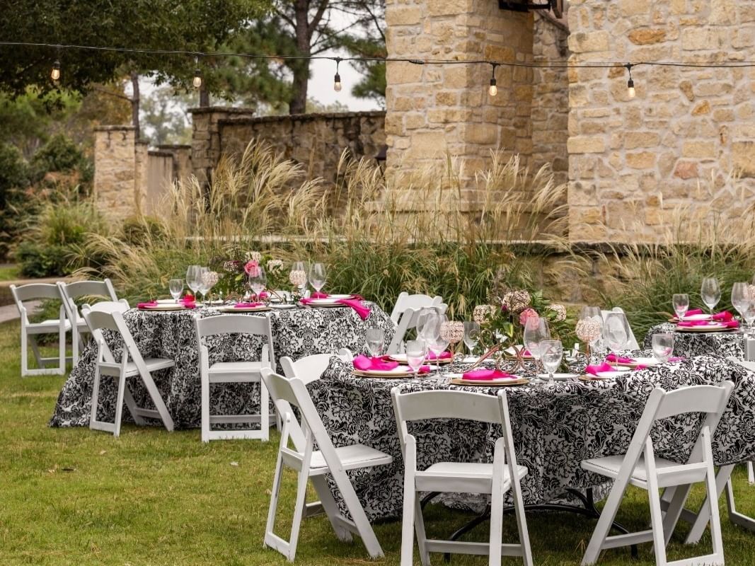 Tables set up on the North Patio Lawn at Shangri-La Resort