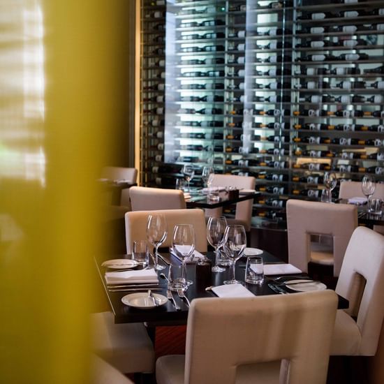 Dining table arranged in a Restaurant at Pullman Olympic park 