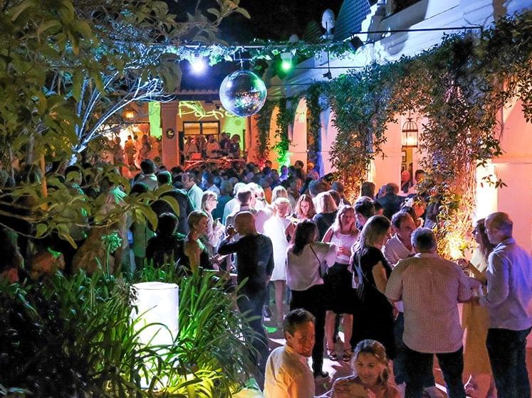 A large group of people enjoying an event in Marbella Club