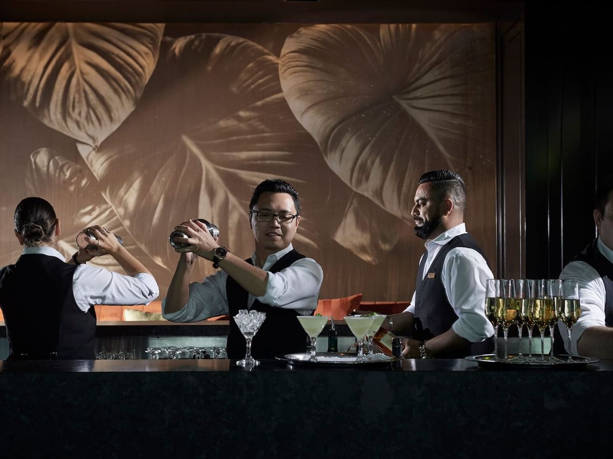 A Bartender making cocktail in Evergreen at Crown Melbourne