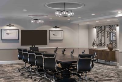 Boardroom set-up in Gorges Room with carpeted floors at Portland Harbor Hotel