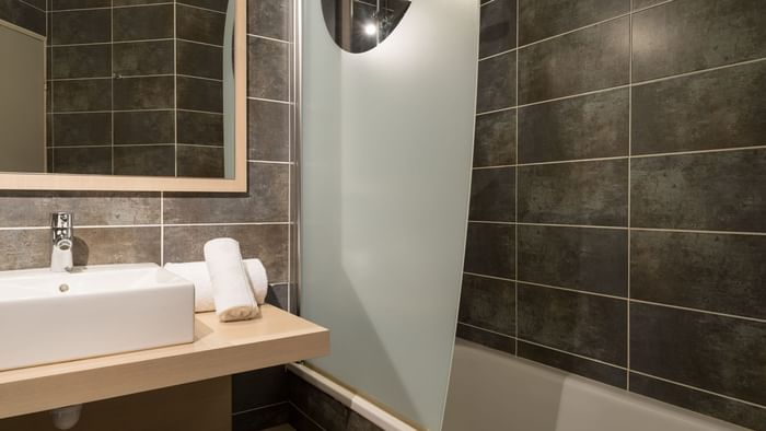 Bathroom vanity in bedrooms at Le Mas de Grille