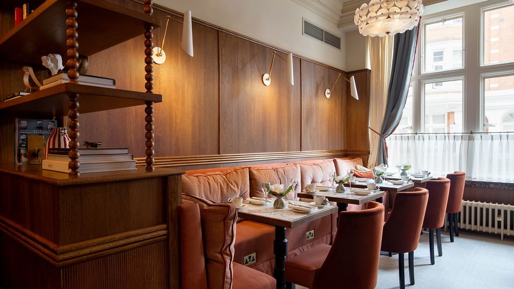 Traditional British Afternoon Tea setting in a modern restaurant at The Capital Hotel, Apartments & Townhouse London.