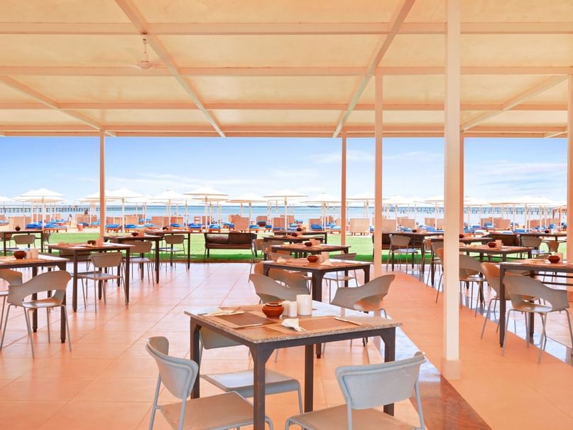 Beach Club dining area with sea view at Pickalbatros Laguna Vista Hotel in South Sinai Governorate.
