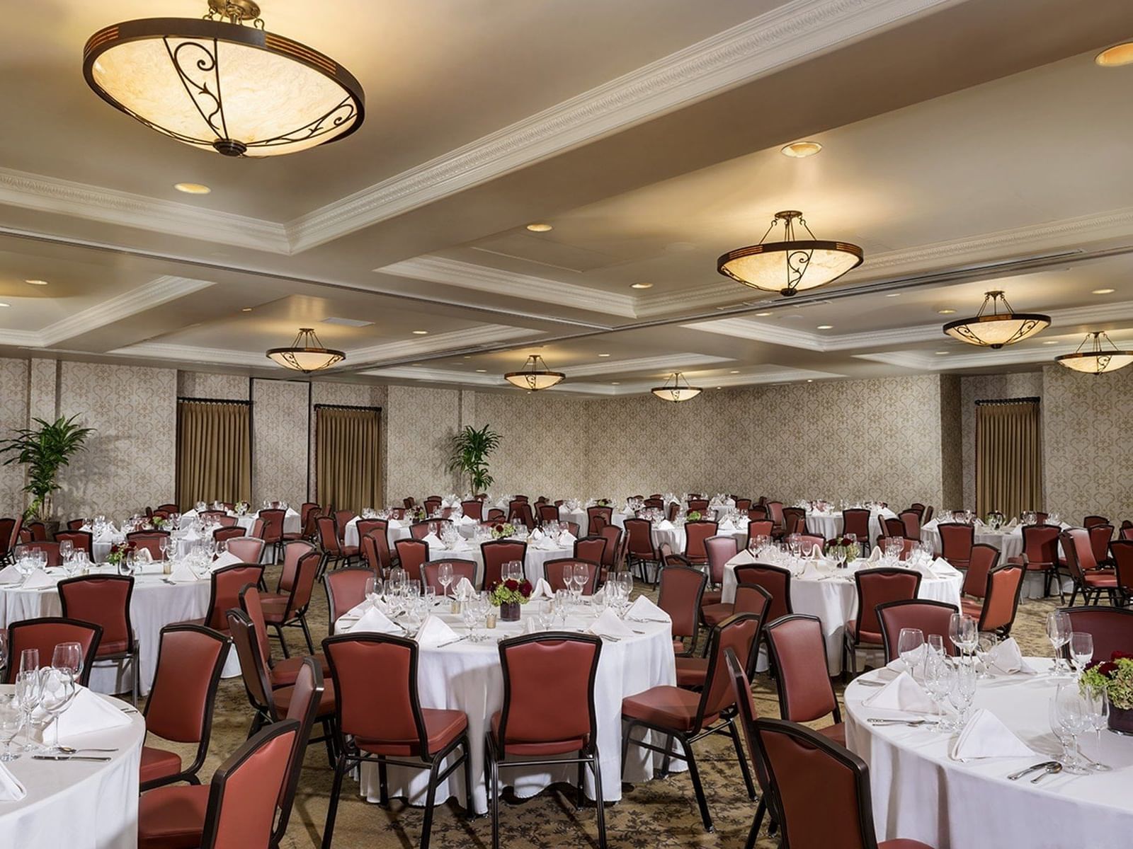 Ballroom with round tables set for dining