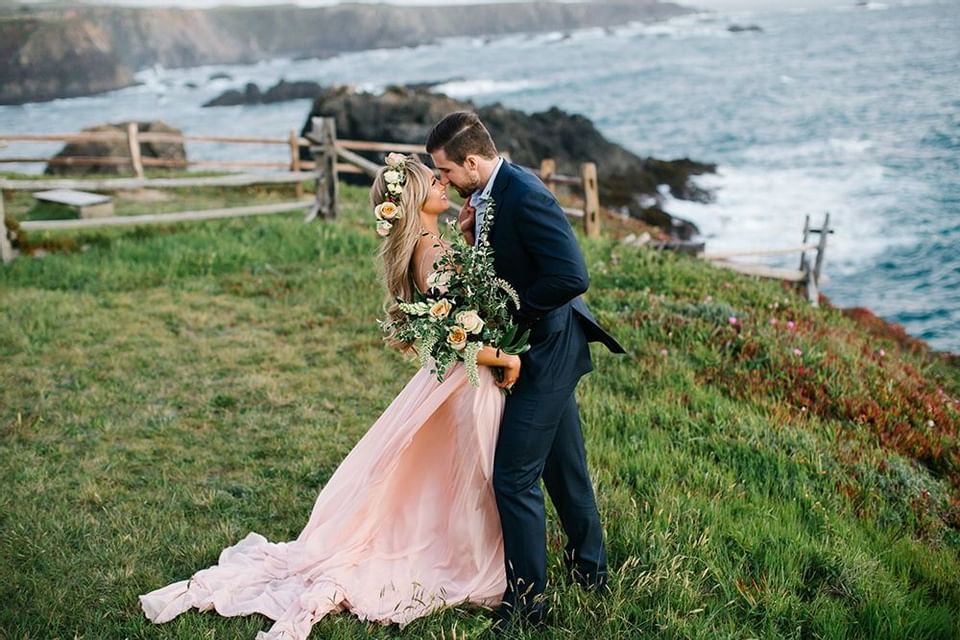 Newlywed couple looking at each other at Heritage House Resort