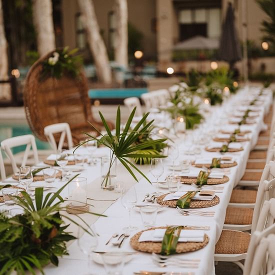 Tropical Poolside Wedding Set up at Pullman Palm Cove Resort