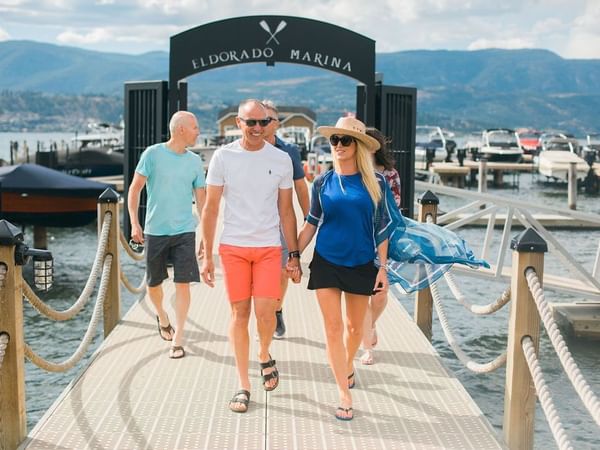 Guests walking together on a dock near Hotel Eldorado