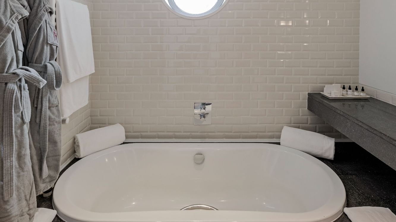 Tub in bathroom in a suite at Bensaude Hotels