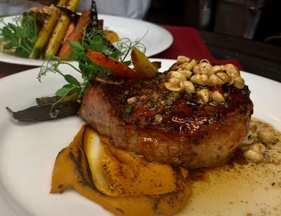 Close-up of steak dish served at The Herrington Inn & Spa