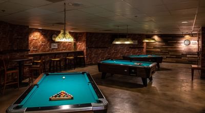 Billiard room interior at NCED Hotel and Conference Center