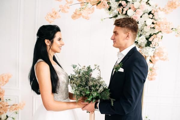 Bride and groom saying their wedding vows to each other