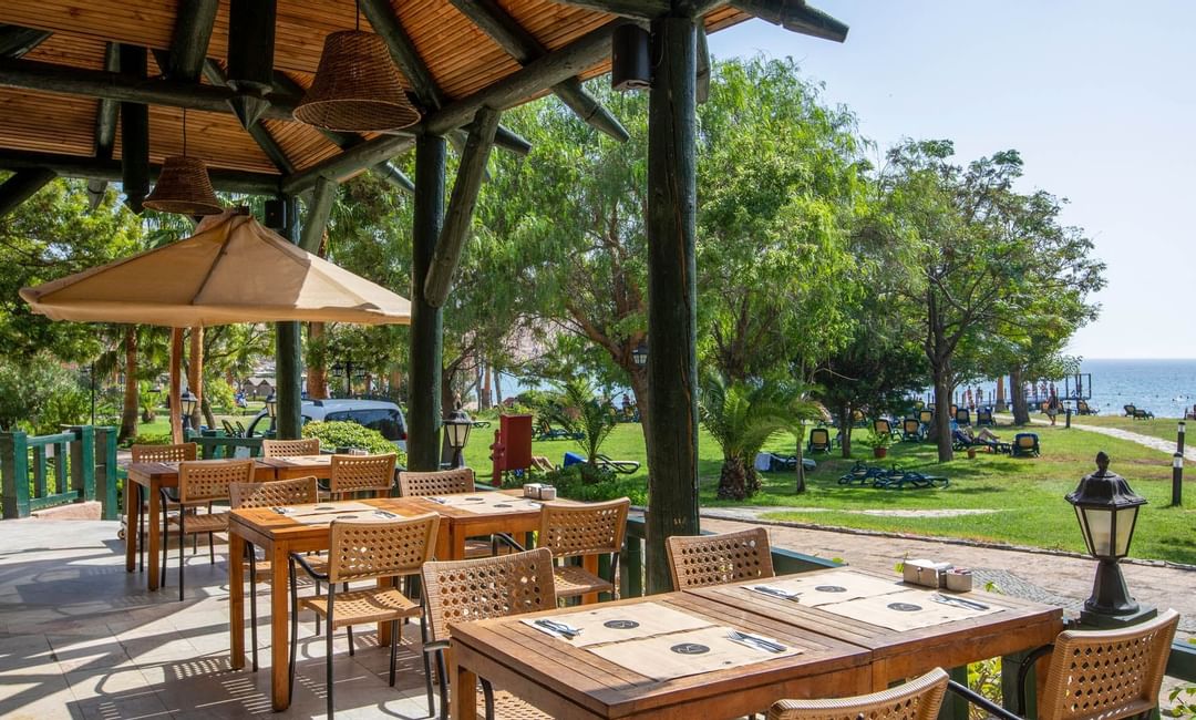 Oyster Restaurant dining area with sea views at Bodrum Imperial