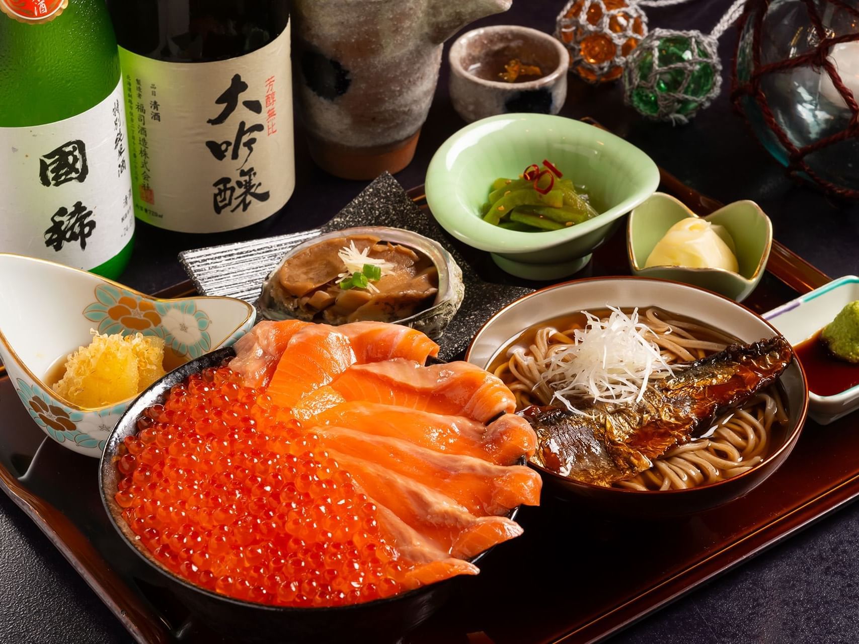 A plate featuring an assortment of seafood and noodles at Grand Park Otaru