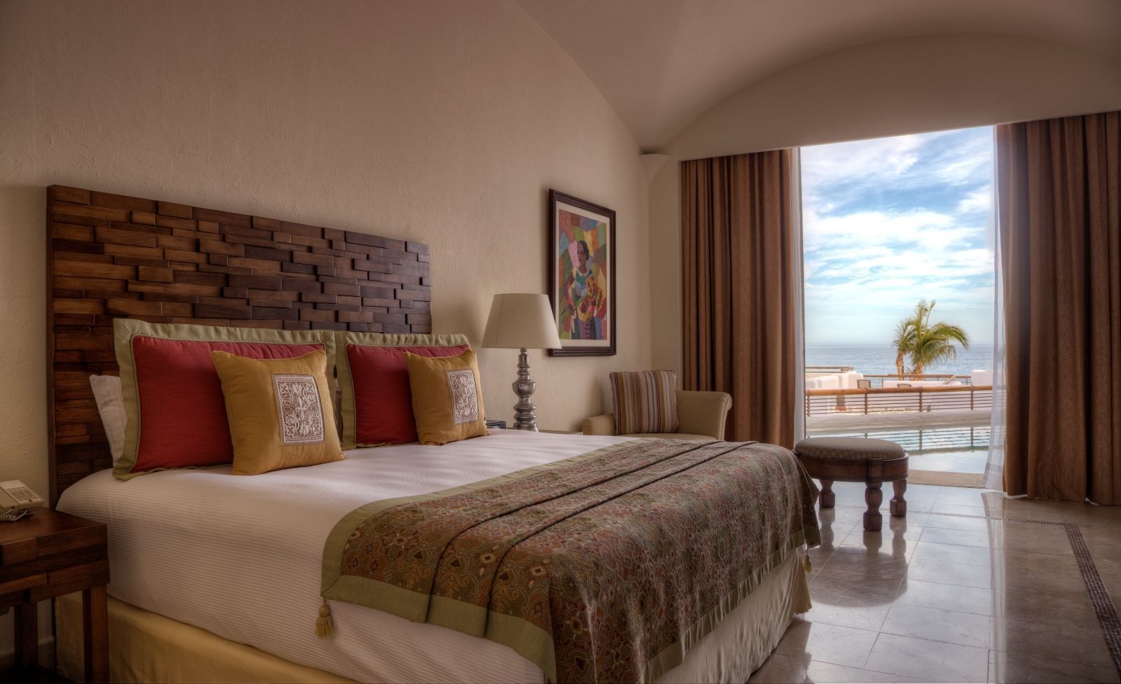 A comfy double bed in a Master Suite at Marquis Los Cabos