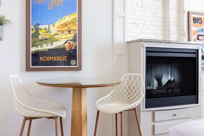 Sitting area with fireplace in Superior Loft at Retro Suites Hotel