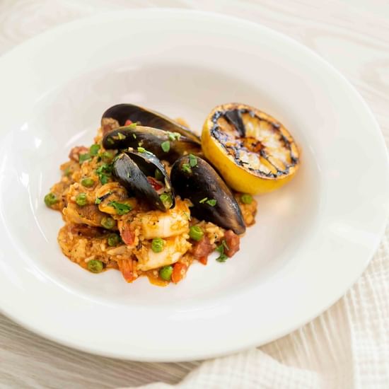 seafood risotto with grilled lemon