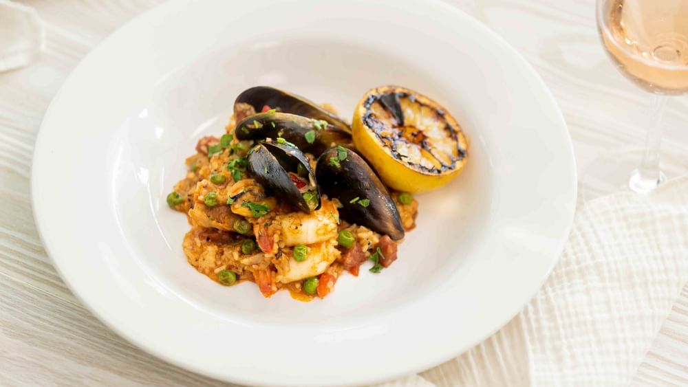 seafood risotto with grilled lemon