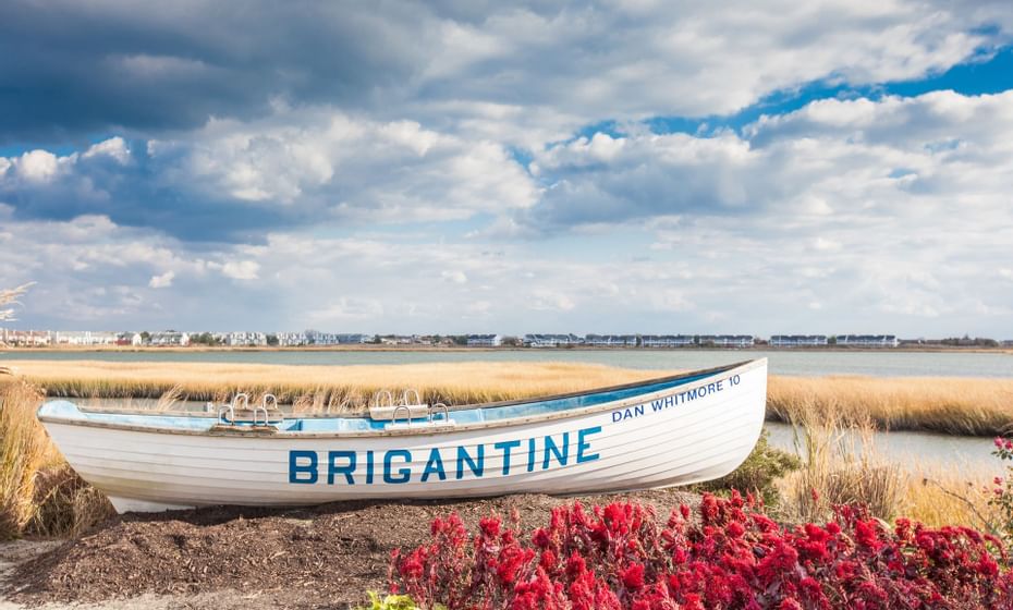 A boat on a brigantine beach near Legacy Vacation Resorts