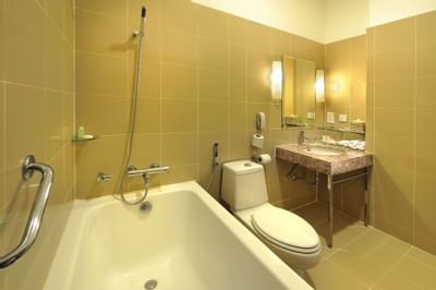Bathroom tub & vanity in a room at Hotel Capitol Kuala Lumpur