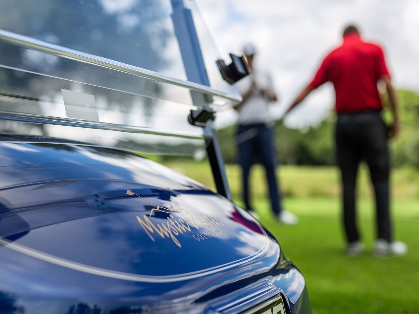 A golf cart at the Golf Club in Mystic Dunes Resort