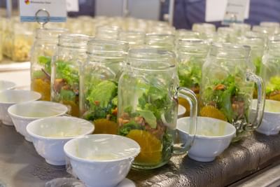 A closeup view of a fresh salad jar at Fiesta Resort