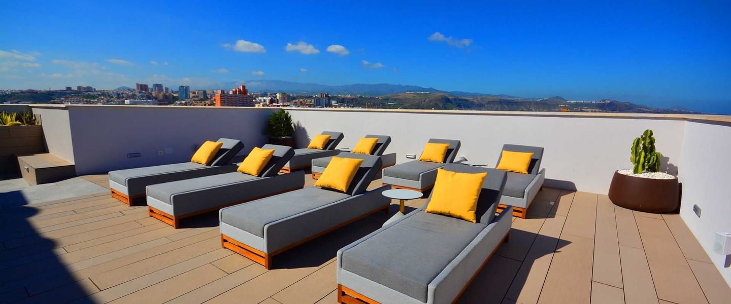 Rooftop seating area at Design Plus Bex Hotel