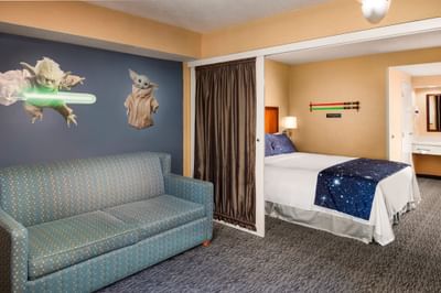 Star Wars themed lounge with bed in Galaxy Suite at Anaheim Portofino Inn, a Disneyland good neighbor hotel with kids suites