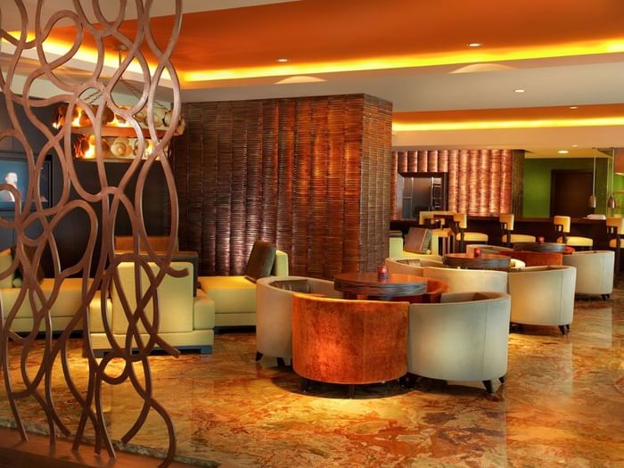 Ciao with elegant seating with wooden tables at Megapolis Hotel Panama