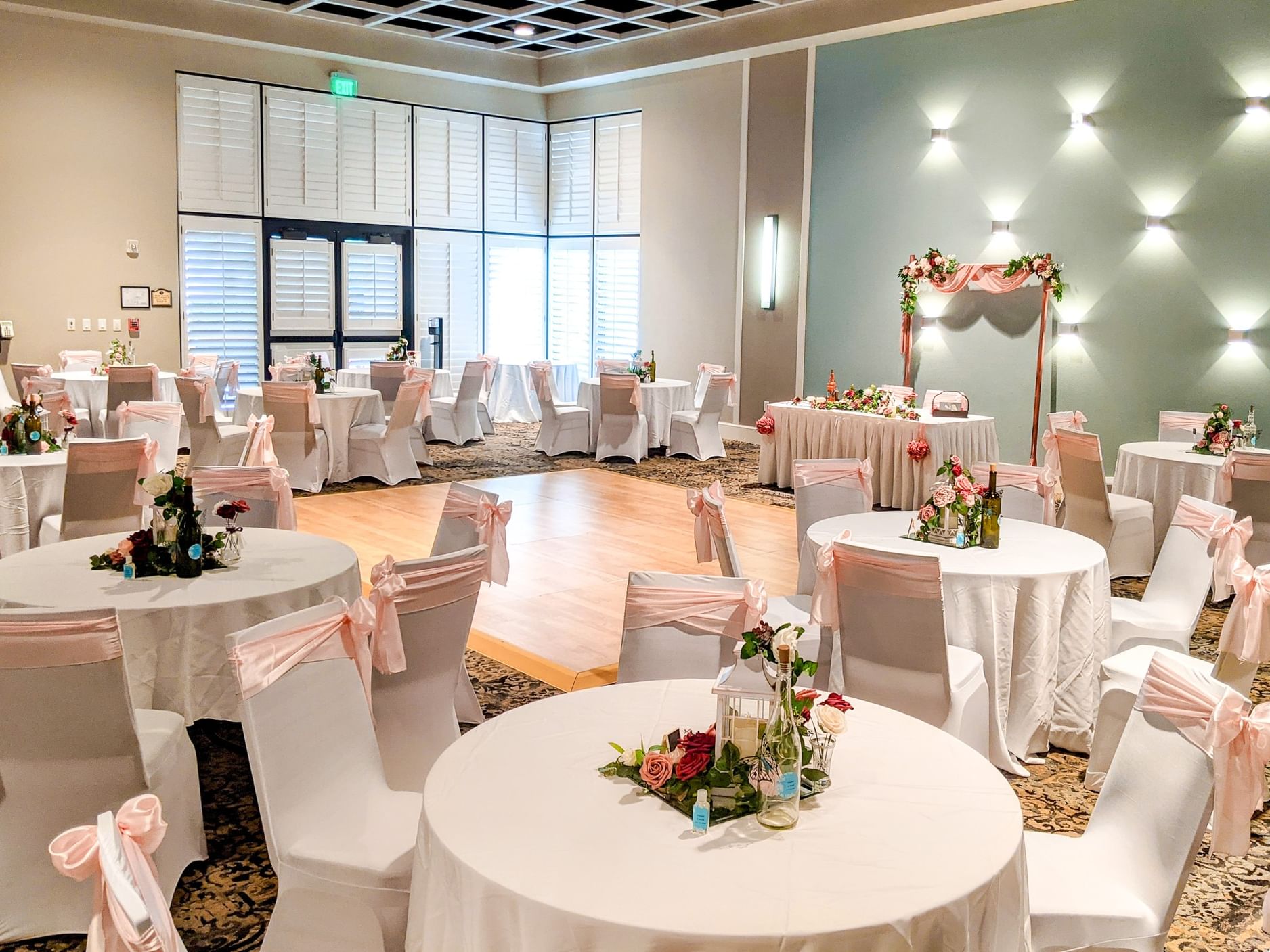 Bella Vista Ballroom set up with round tables and chairs at Rosen Inn Lake Buena Vista in Orlando.
