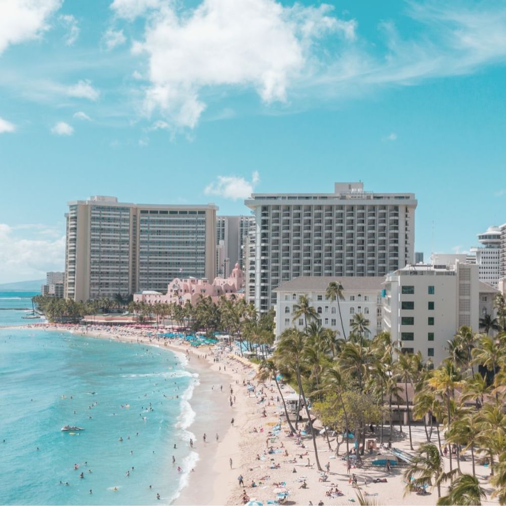 Distant view of the city & Beach on a sunny day near Waikiki Resort Hotel by Sono